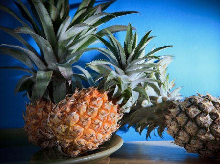 pineapple on wood table for multipurposeの写真素材