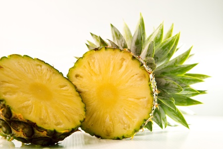 freshness of sliced pineapple on white background for multipurposeの写真素材