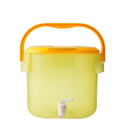 yellow plastic ware isolated on white の写真素材
