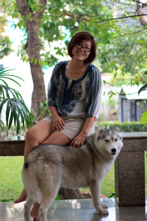 Woman and siberian husky dog with relaxing emotionの写真素材