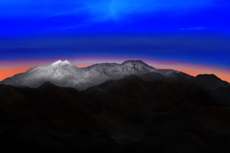 land scape of snow mountain hill with beautiful dramatic colorful sky before morning dawn light use for nature background and backdropの写真素材