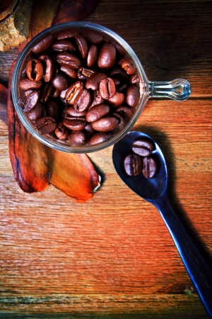 roast coffee bean in glass shot on wood table use coffee topic and relatedの写真素材