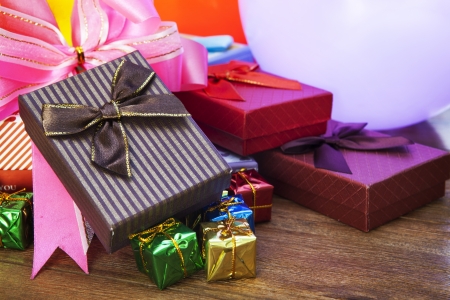 stack of gift box lying on top wood table の写真素材