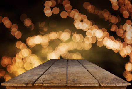 old wood table in field with blur background use for outdoor background の写真素材