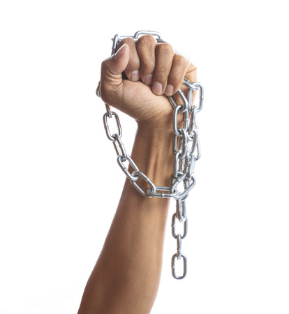 hand hold hard shiny metal chain isolated on white background の写真素材