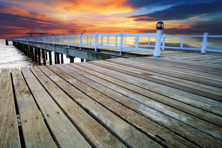 wood piers and pavillion sea scene with dusky sky use for natural background ,backdrop の写真素材