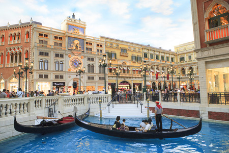 COTAI STRIP, MACAU, CHINA-AUGUST 22 visitor on gondola boat in Venetian Hotel  The famous shopping mall, luxury hotel important landmark and the largest casino in the world on august 22,2014 in Macau China のeditorial素材