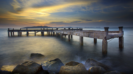 damage of old piers structure with beautiful morning light in khao leam ya sea national park rayong province eastern of thailandの写真素材