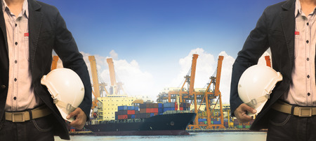 working man in port authority use for shipping ,logistic,vessel,nautical and marine transport,container yard and import,export ,loading industryの写真素材