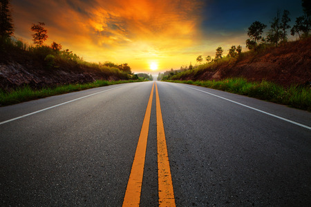 beautiful sun rising sky with asphalt highways road in rural scene use land transport and traveling background,backdropの写真素材