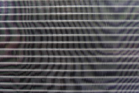close up texture pattern of air condition exhaust coil  use for industry background,backdrop