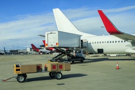 cargo plane loading commercial product in airportのeditorial素材