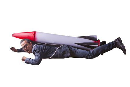 asian business man flying with rocket power isolated white background for speed and competition in leader ship conceptの写真素材