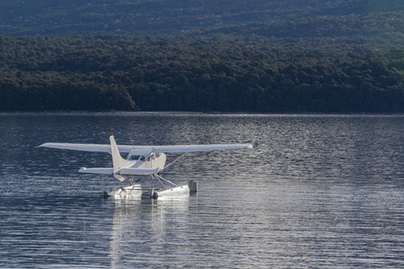 water plane floating over te anau lake fiordland national park new zealandの写真素材