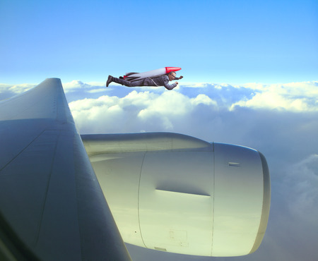 flying business man carrying strategy rocket speed competition with jet plane over sky for business...