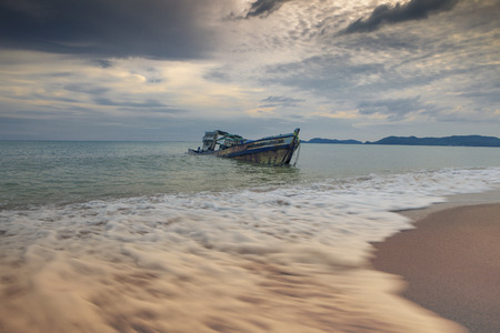 sea scape of wreck boat on beach