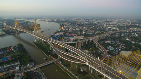 aerial view of bhumibol bridge crossing chaopraya river in bangkok thailandの写真素材