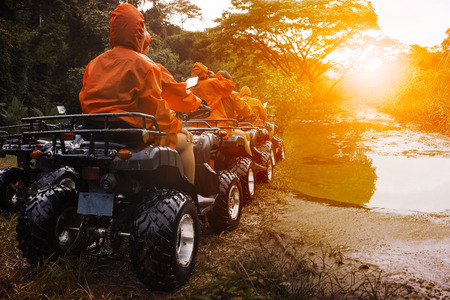atv sport vehicle team ready to adventure in mud track