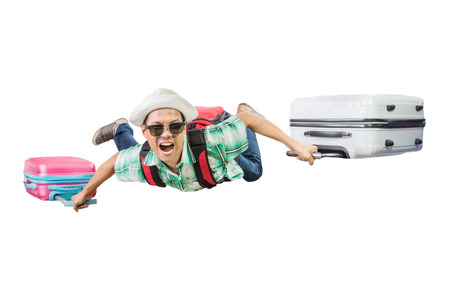 traveling man flying with luggage bag floating isolated white backgroundの写真素材