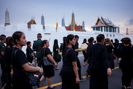 BANGKOK THAILAND - OCTOBER 5,2017 : thai mourners people wearing black clothes on last day of respect to their beloved king bhumibol adulyadejat at grand palaceのeditorial素材