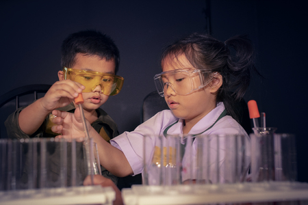 asian children in science examination laboratoryの写真素材