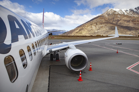 queenstown new zealand - september6,2015 : qantas airline plane approach for departure from queenstown airport southland new zealandのeditorial素材