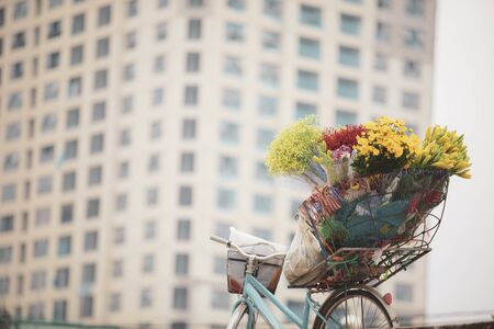 yellow flower bouquet on olb bicycle in hanoi vietnamの写真素材