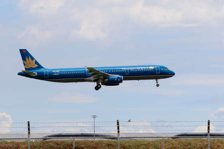 bangkok thailand - august22,2015 : airbus 321 plane of vietnam airlines approach for landing to...