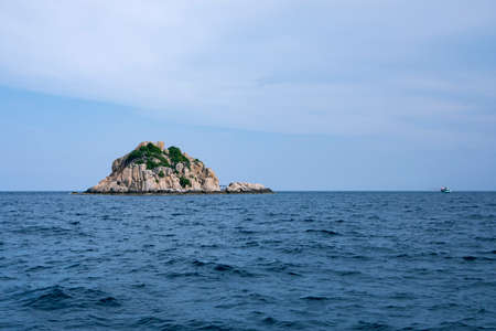 rock island and deep blue sea at thailand gulfの写真素材