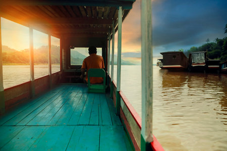sailing in mekong river one of most popular traveling activity in luangprabang northern of laoの写真素材