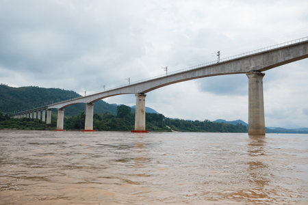 hi-speed railway bridge crossing mekong river in luangprabang northern of laoの写真素材