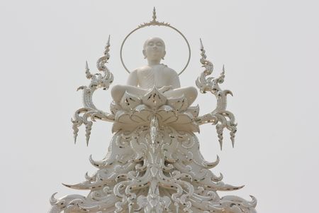 The white buddha sculpture on throneの写真素材