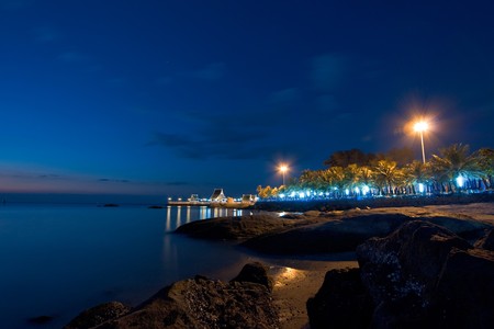 still sea and pavilion at duskの写真素材