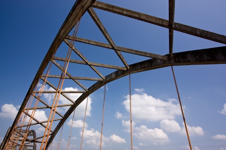 truss bridge in blue skyの写真素材