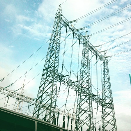 Electricity and blue sky background.