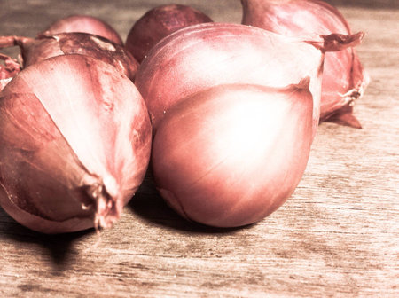 Shallots on the wooden backgroundの素材