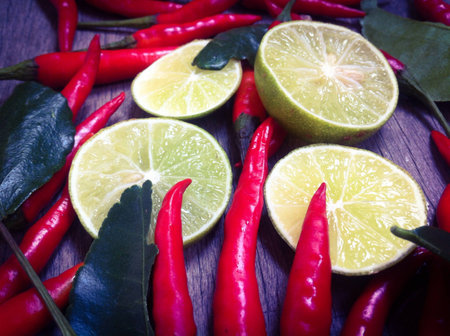 Fresh paprika and lemon on the wooden .の素材
