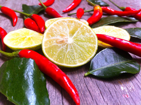 Fresh paprika and lemon on the wooden .の素材
