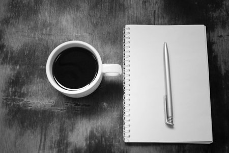 Cup of coffee on the wooden backgroundの写真素材