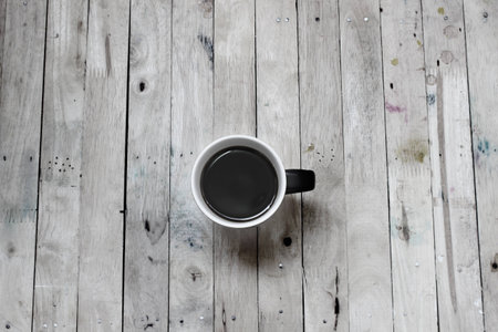 Cup of coffee on the wooden backgroundの写真素材
