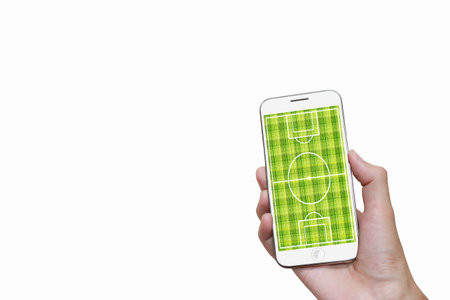 Man hand holding mobile smart phone with football stadiumの写真素材