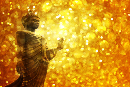 Buddha statue on golden background,の写真素材