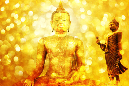 Buddha statue on golden background,の写真素材