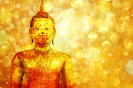 Buddha statue on golden background,の写真素材