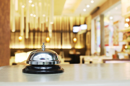 Service bell at the restaurant with bokeh blur backgroundの写真素材