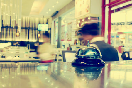 Service bell at the restaurant with bokeh blur backgroundの写真素材