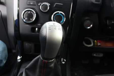 Interior of a modern car with a steering wheel and automatic transmissionの写真素材