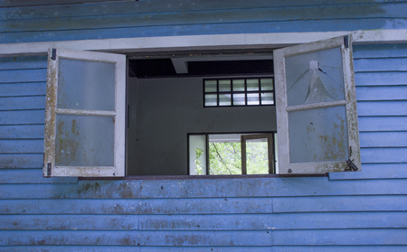 Old wooden wall with window - texture or backgroundの写真素材