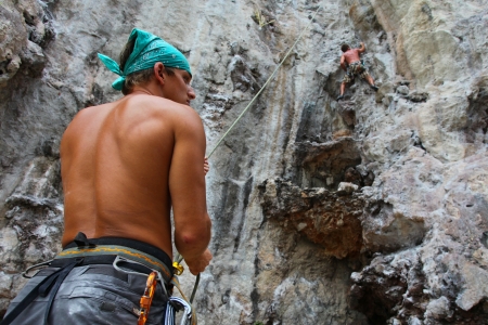 KRABI, THAILAND - JANUARY 25 : Unidentified rock climbers during a climbing session on January 25, 2011 in Krabi, Thailand. Rock climbing in Krabi becomes popular over recent years.のeditorial素材