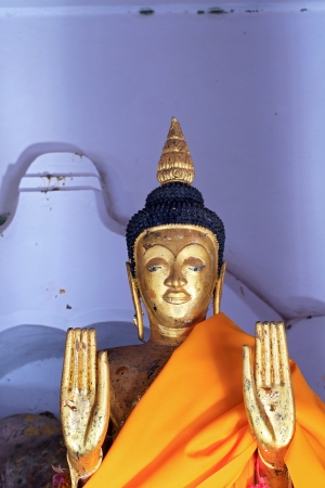 Buddha statue showing both palms close up の写真素材